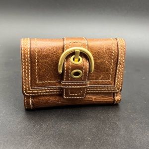 Coach Leather Buckle Trifold wallet.